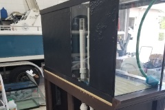 20190920 160255  After the latex paint failed, I tried using the Flex Seal spray on the back of the aquarium. It appears to have adhered much better to the glass than the latex paint. Albeit kind of lumpy on the right side, however the lumpiness is not visible from the inside of the tank.