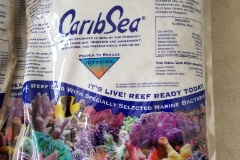 20190928 135539  We are going to use CaribSea "Reef Sand" 'live' sand.  I bought four 20 lb bags. Hopefully that's enough.