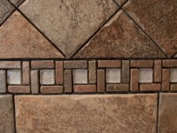 IMG 1492  Here's a closeup photo of the decorative band/listello that I took in order to ask a question on the the John Bridge tile forum about sealing the mosaic tile in the decorative band before grouting.  The mosaic tiles on the decorative band are unglazed so there appearance changes dramatically when they are wet.  We prefer the darker wet look so I am going to apply an enhancer wet look sealer before grouting.