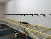 IMG 2898  October 18 2015 - I have mounted all the Closet Maid wall tracks and 16" shelf brackets into studs to support the middle level.