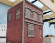 20190217 113149  I put a light coat of "Khaki Tan" on the window boards and then a dark wash.  The boards look much better.