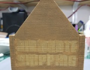 20190217 114141  Making lemonade out of lemons.  I cleaned up the sign as much as possible and then put a light coat of the building's base 'Toffee' color on top to create a 'Ghost' sign.