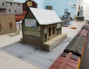 20190218 102525  I mounted the Tood's Tomatoes sign on 12x12 wood posts to project it out from the ghost sign.